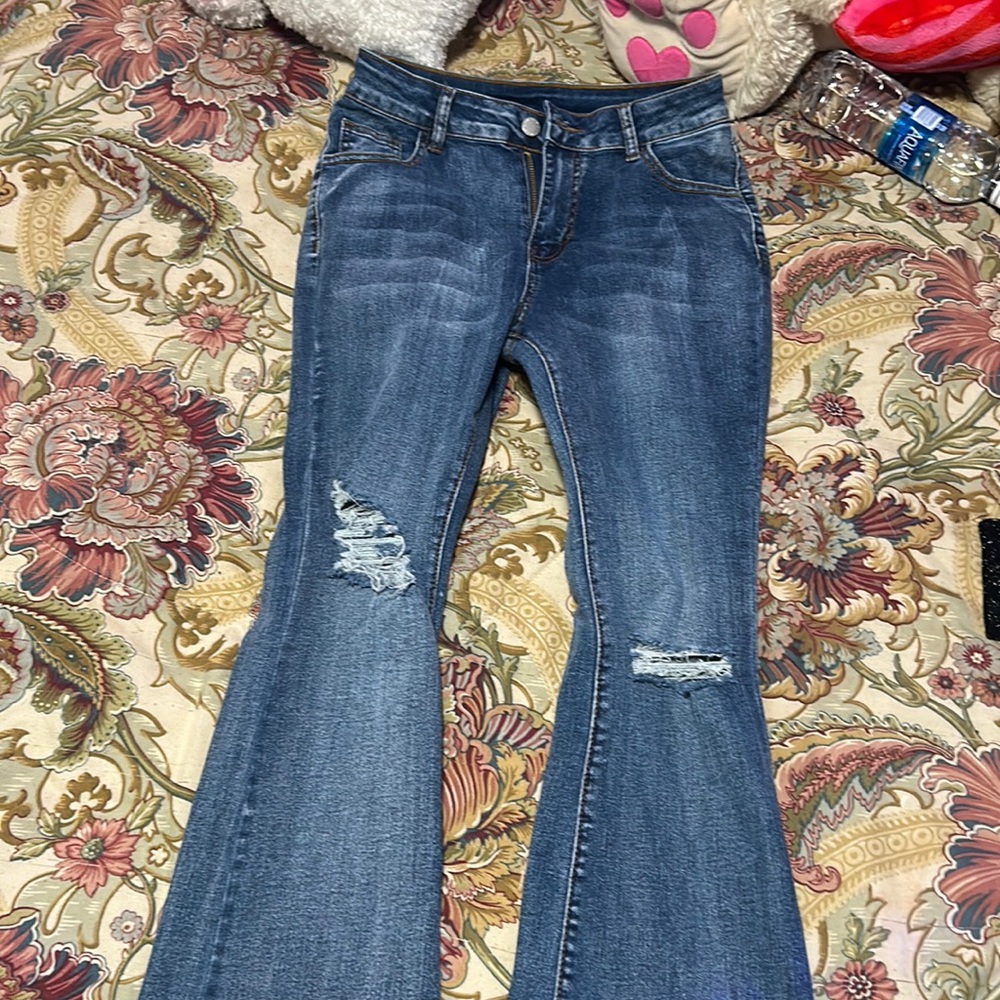 l medium washes ripped bootcut jeans